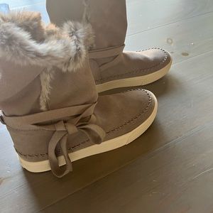Tom’s fuzzy moccasin boots